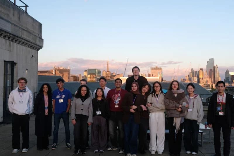 KCL Tech committee members standing together on a London rooftop.